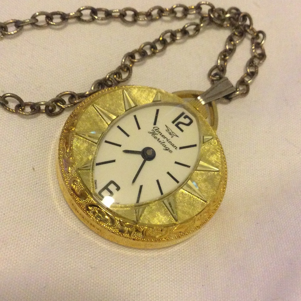 American heritage necklace clock